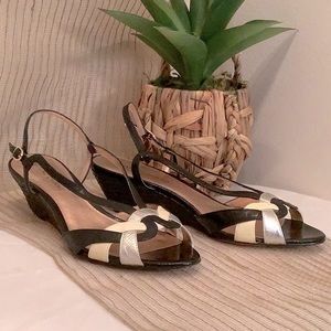 Arturo Chiang 8.5 m soft sensual sole. Black wicker wedge 2” heel.